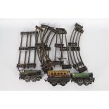 Hornby - A collection of O Gauge items including two clockwork engines, one Model 20, one Model MO,