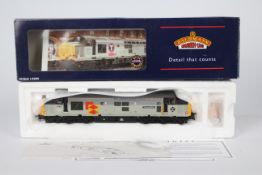 Bachmann - A OO gauge Class 37/5 Diesel loco named Tre Pol And Pen in Railfreight livery operating