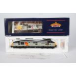 Bachmann - A OO gauge Class 37/5 Diesel loco named Tre Pol And Pen in Railfreight livery operating