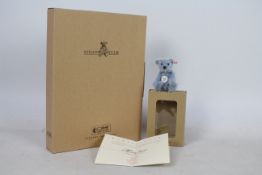 Steiff - A boxed miniature mohair 'Annual Gift 2004' bear - The light blue bear has plastic eyes,