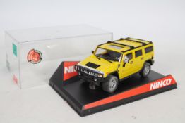 Ninco - A boxed 1:32 scale die-cast hummer vehicle - Lot includes a #50457 Hummer H2 in a yellow