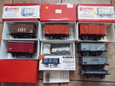 Peco and other - eight O gauge goods wagons comprising three by Peco,