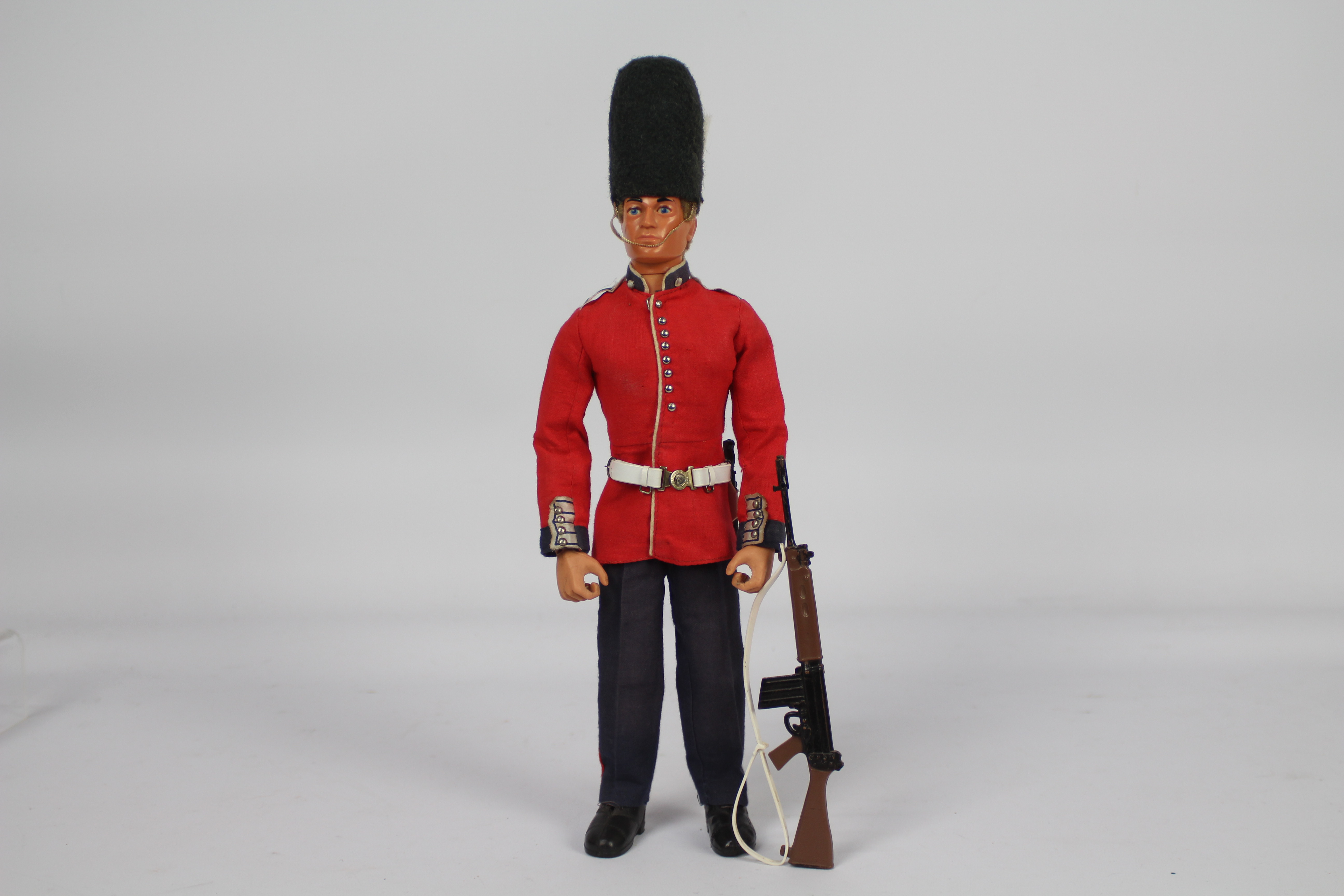 Palitoy, Action Man - A Palitoy 'Talking' Action Man figure in Grenadier Guard outfit .