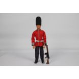 Palitoy, Action Man - A Palitoy 'Talking' Action Man figure in Grenadier Guard outfit .
