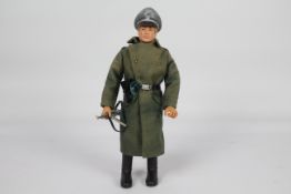 Palitoy, Action Man - A Palitoy Action Man figure in German Camp Kommandant outfit.