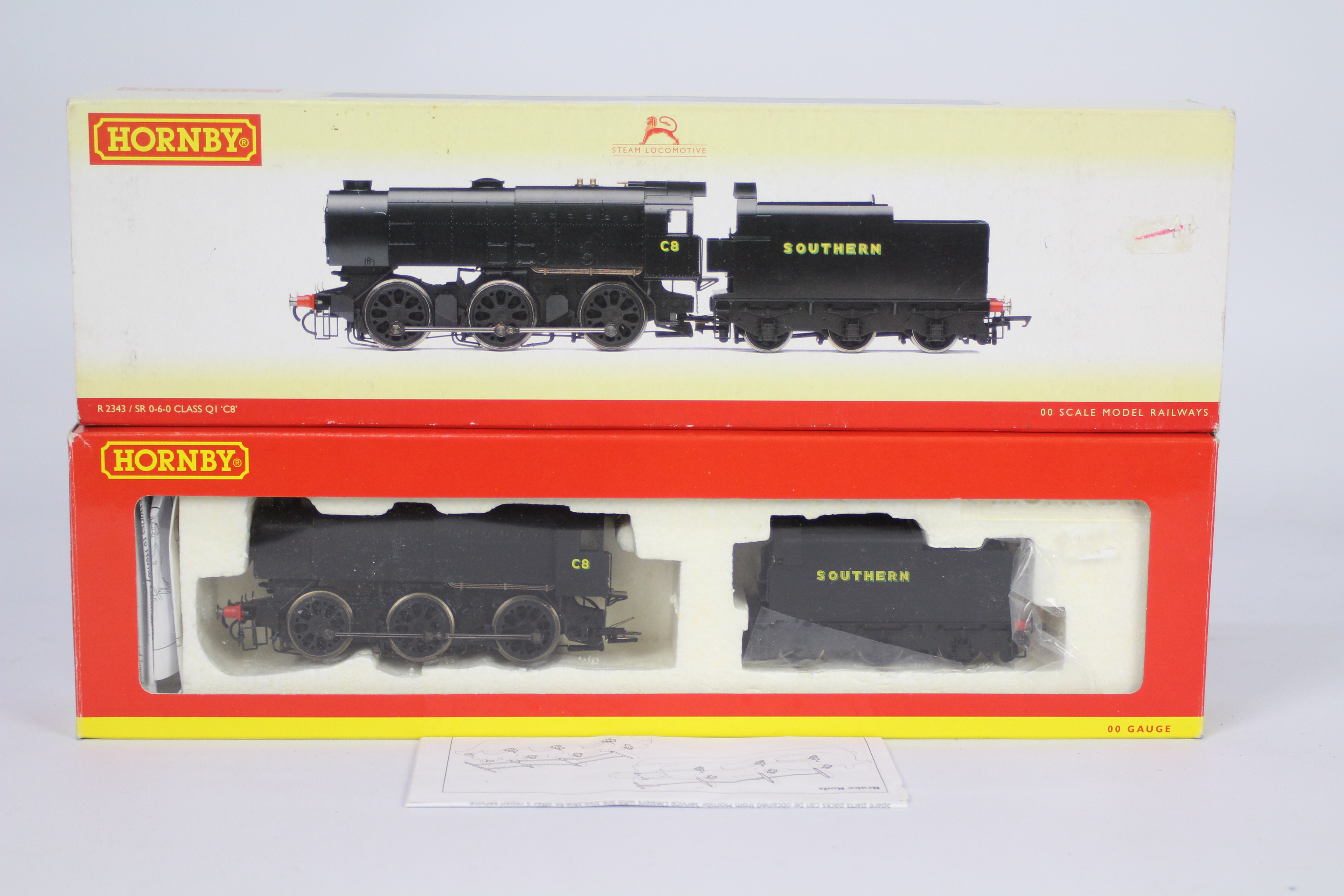 Hornby - A boxed Hornby OO gauge train - The #R2343 / SR 0-6-0 Class QI 'CB' train appears in