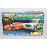 Scalextric - A boxed Street Pursuit set # C1199 with Lamborghini Gallardo and Range Rover Police