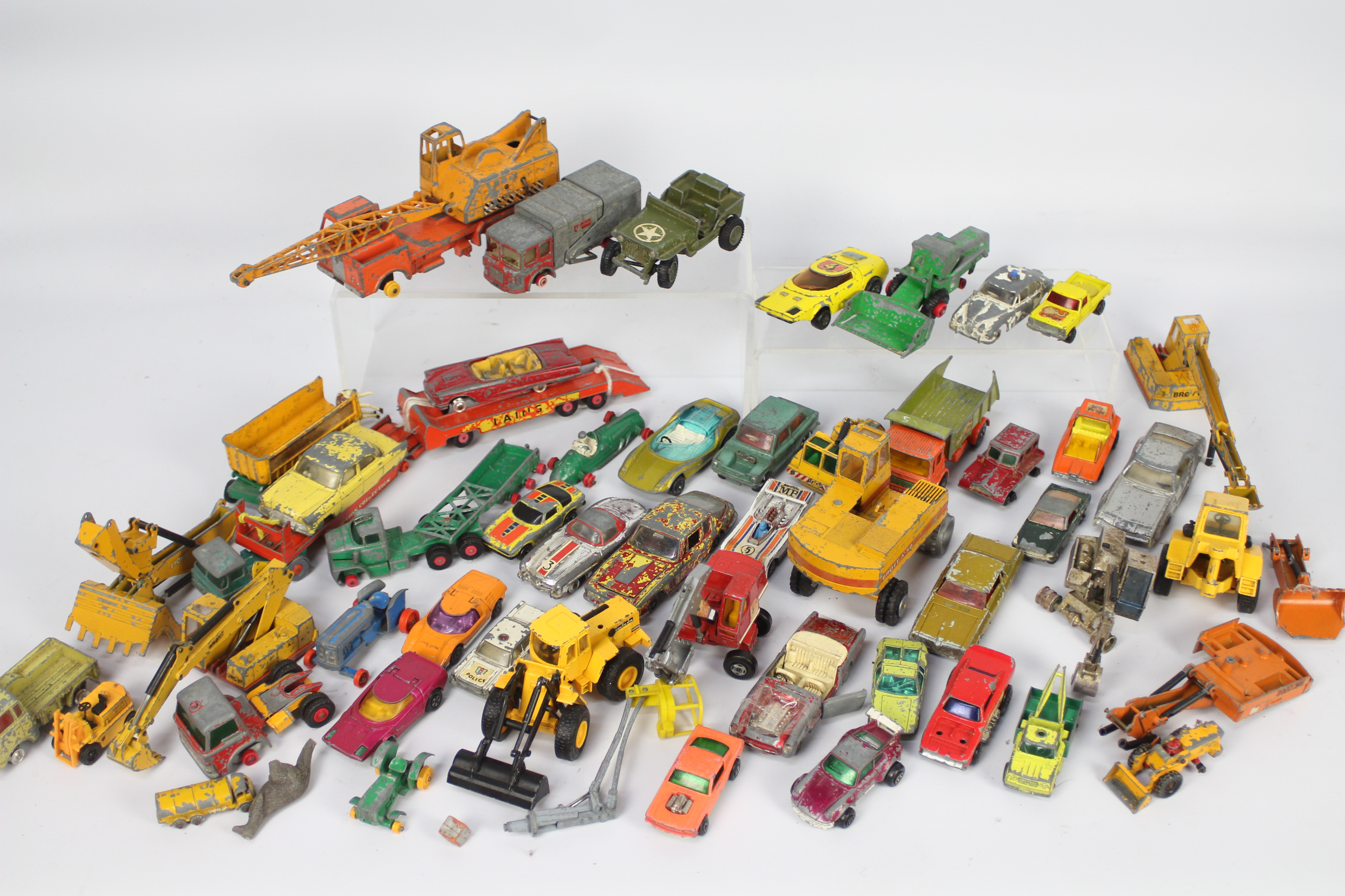 Diecast - A large quantity (approximately 40+) of playworn diecast vehicles to include, Corgi,