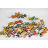 Diecast - A large quantity (approximately 40+) of playworn diecast vehicles to include, Corgi,