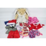 Build-a-Bear - A selection of Build-a-Bear clothing and a bear - Within the lot there is a mohair