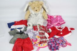 Build-a-Bear - A selection of Build-a-Bear clothing and a bear - Within the lot there is a mohair