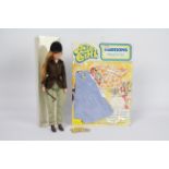 Palitoy, Action Girl - A Palitoy Action Girl figure dressed in riding attire with riding hat,