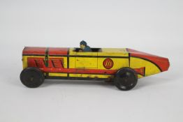 Marx - A rare clockwork tinplate racing car probably made by Marx,