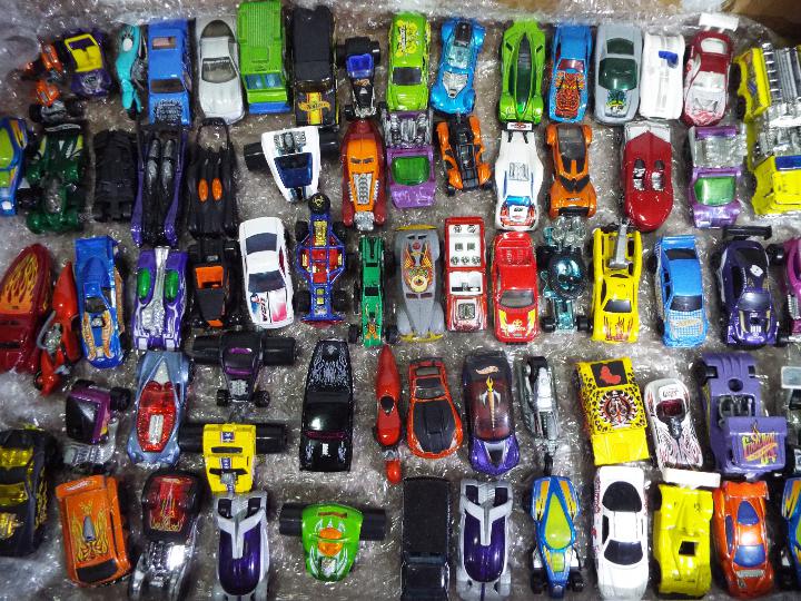 Hot Wheels - A collection of 70 plus loose play worn Hot Wheels models including Toyota MR2,