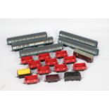 Hornby - A collection of 19 x unboxed OO gauge wagons and coaches including 10 x 7 plank wagons in