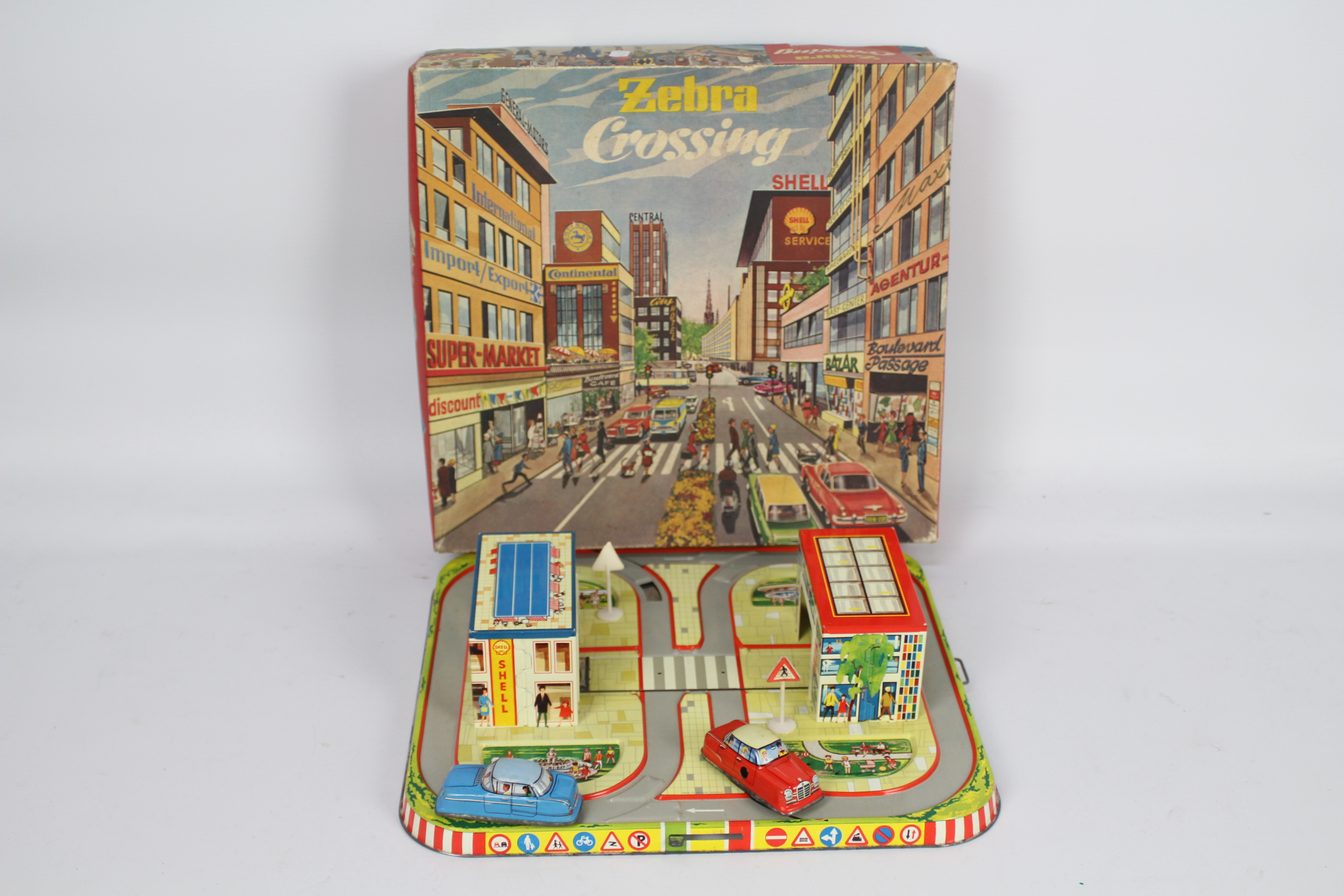 Technofix - A boxed tinplate Zebra Crossing set # 310 with clockwork Mercedes and Opel cars on a