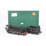 An O gauge kit built metal diecast standard class 4MT 2-6-0 locomotive and tender, op no 76030,