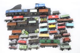 Hornby, Triang - 25 x unboxed Hornby and Triang OO gauge wagons,