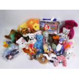 Ty Beanies - A group of 25 Beanies and a Beanie Collectors Bag with coin and bear.