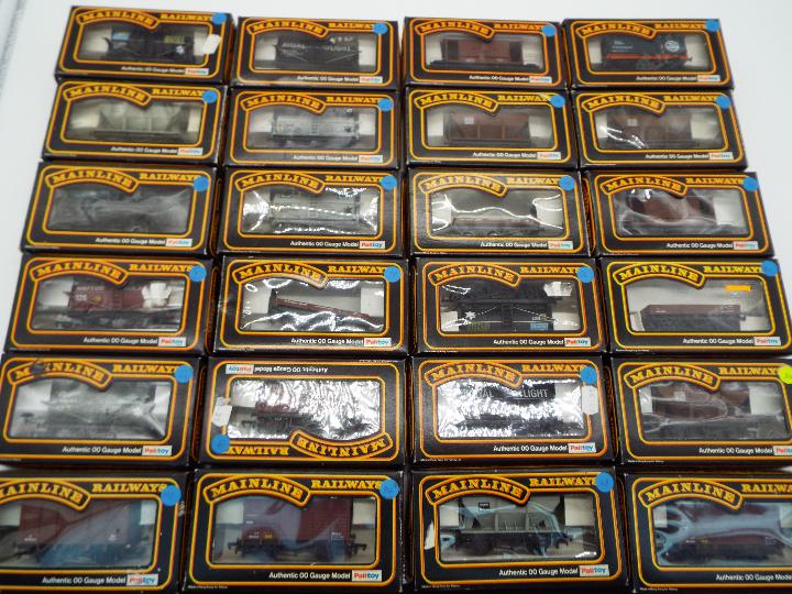 Mainline Railways - 24 boxed OO gauge model goods / freight wagons,