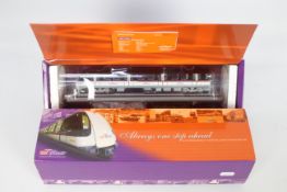 CMNL - A limited edition OO gauge Alstrom Train model in Singapore's SBS Transit livery from 2003.