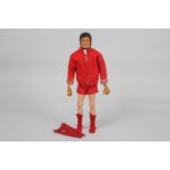 Palitoy, Action Man - A Palitoy Action Man Liverpool FC Footballer figure with sideburns.