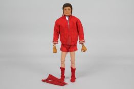 Palitoy, Action Man - A Palitoy Action Man Liverpool FC Footballer figure with sideburns.