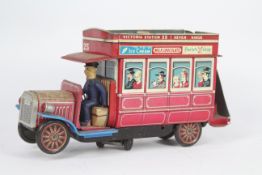 Modern Toys - A battery powered tinplate Type B London Bus model made by Modern Toys in Japan.