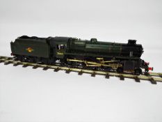 An O gauge kit built metal diecast standard class 4MT 4-6-0 locomotive and tender, op no 75069,