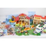 Playmobil - A large quantity of Playmobil items including car, camper van, swimming pool,