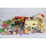 Sylvanian Families - A large quantity of Sylvanian Families items including car, caravan,