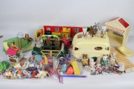 Sylvanian Families - A large quantity of Sylvanian Families items including car, caravan,