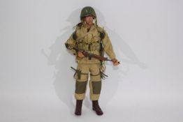 Dragon - An unboxed Dragon 12" action figure of a WW2 US Paratrooper NCO 'Danny McMillan' .