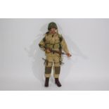 Dragon - An unboxed Dragon 12" action figure of a WW2 US Paratrooper NCO 'Danny McMillan' .