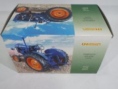 Universal Hobbies - A boxed Fordson Major E27N tractor in 1:16 scale # 90928.