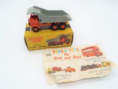 Budgie Toys - a die-cast Foden heavy duty Dump Truck # 226, orange body and wheels, grey tipper,