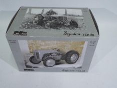 Universal Hobbies - A boxed Ferguson TE20 tractor in 1:16 scale # 99702.