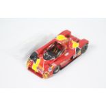 Starter - A hand made resin Ferrari 333 SP race car in classic red livery # LM96.