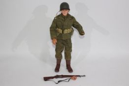 Dragon - An unboxed Dragon 12" action figure of a WW2 US Soldier.