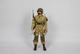 Dragon - An unboxed Dragon 12" action figure of a WW2 US Airborne Paratrooper Sergeant.