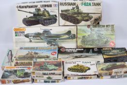 Matchbox, Tamiya, Airfix, Others - A collection of 13 boxed plastic model kits in various scales.