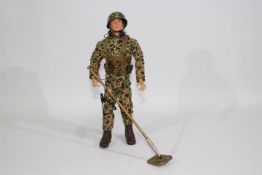 GI Joe, Hasbro - An unboxed vintage Hasbro GI Joe action figure in Marine Demolition outfit.