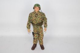 GI Joe, Hasbro - An unboxed vintage Hasbro GI Joe Action Marine figure.