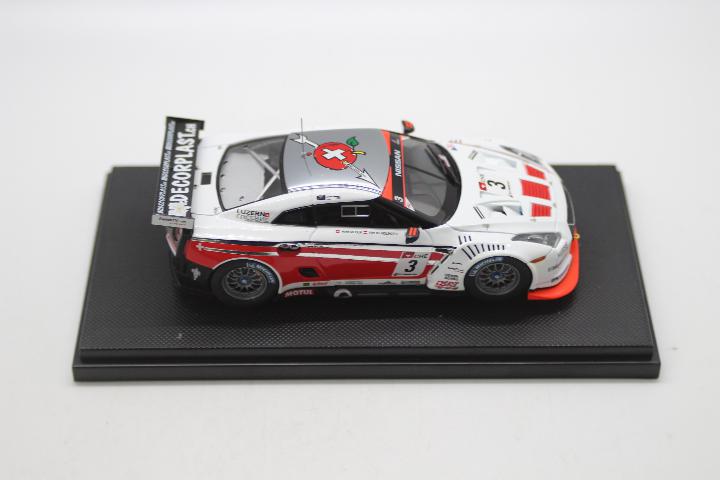 Ebbro Racing - A boxed 1:43 scale 2010 Nissan GT-R GT1 in Swiss Racing Team number 3 livery # 44355. - Image 4 of 5