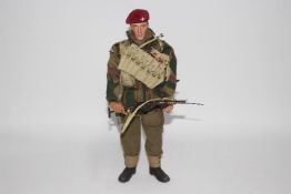 Blue Box - An unboxed Blue Box 'Elite Force' 12" action figure of a WW2 British Paratrooper 'Sgt