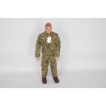 GI Joe, Hasbro - An unboxed vintage Hasbro GI Joe Action Marine figure.