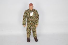 GI Joe, Hasbro - An unboxed vintage Hasbro GI Joe Action Marine figure.