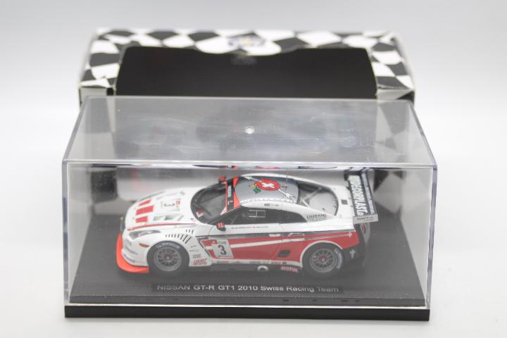 Ebbro Racing - A boxed 1:43 scale 2010 Nissan GT-R GT1 in Swiss Racing Team number 3 livery # 44355.