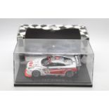 Ebbro Racing - A boxed 1:43 scale 2010 Nissan GT-R GT1 in Swiss Racing Team number 3 livery # 44355.