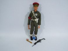 Pedigree, Tommy Gunn - A pedigree 'Tommy Gunn' Military Policeman action figure,